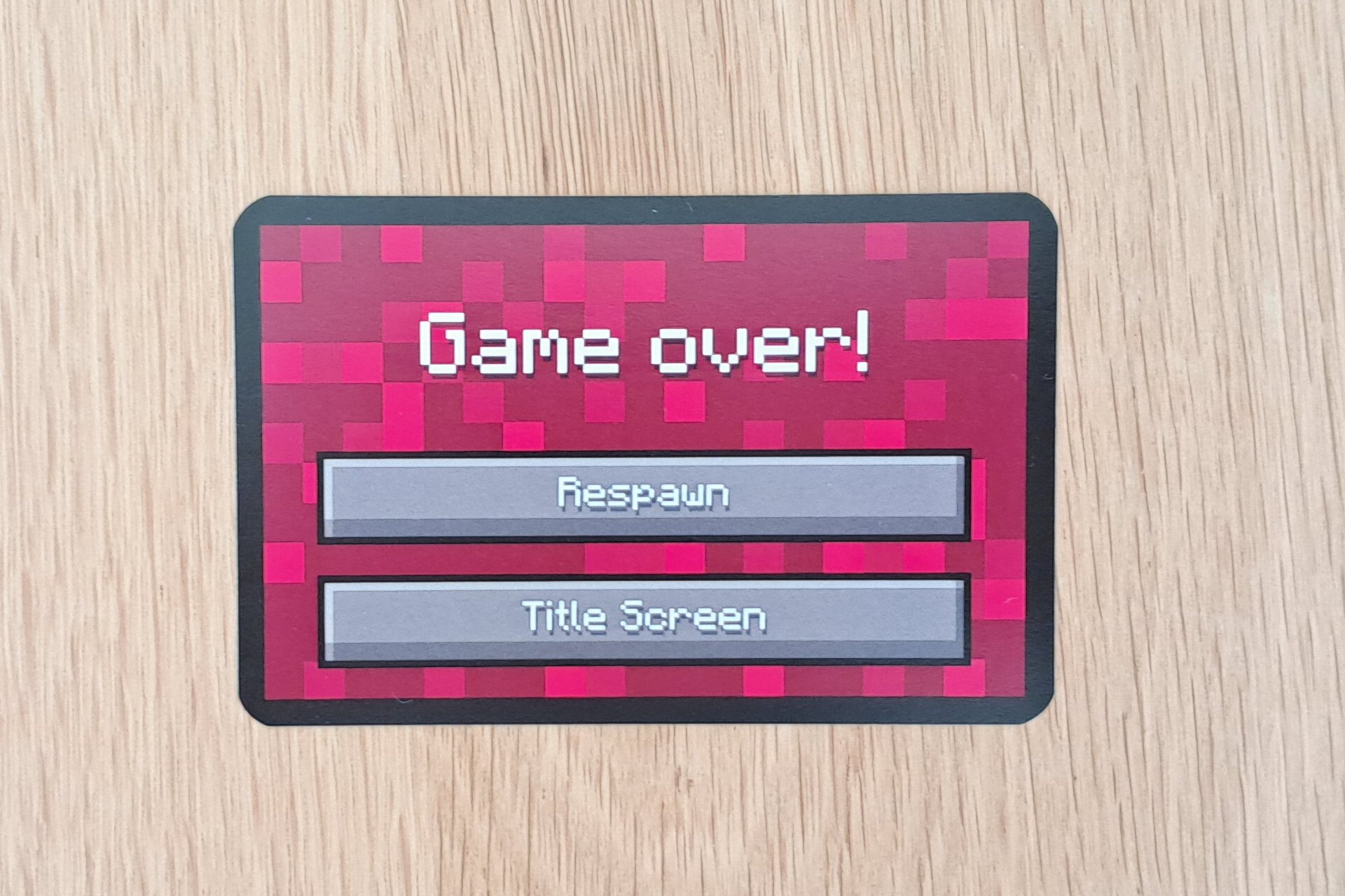 Close up photo of the Game Over card from the Minecraft Explorers card game
