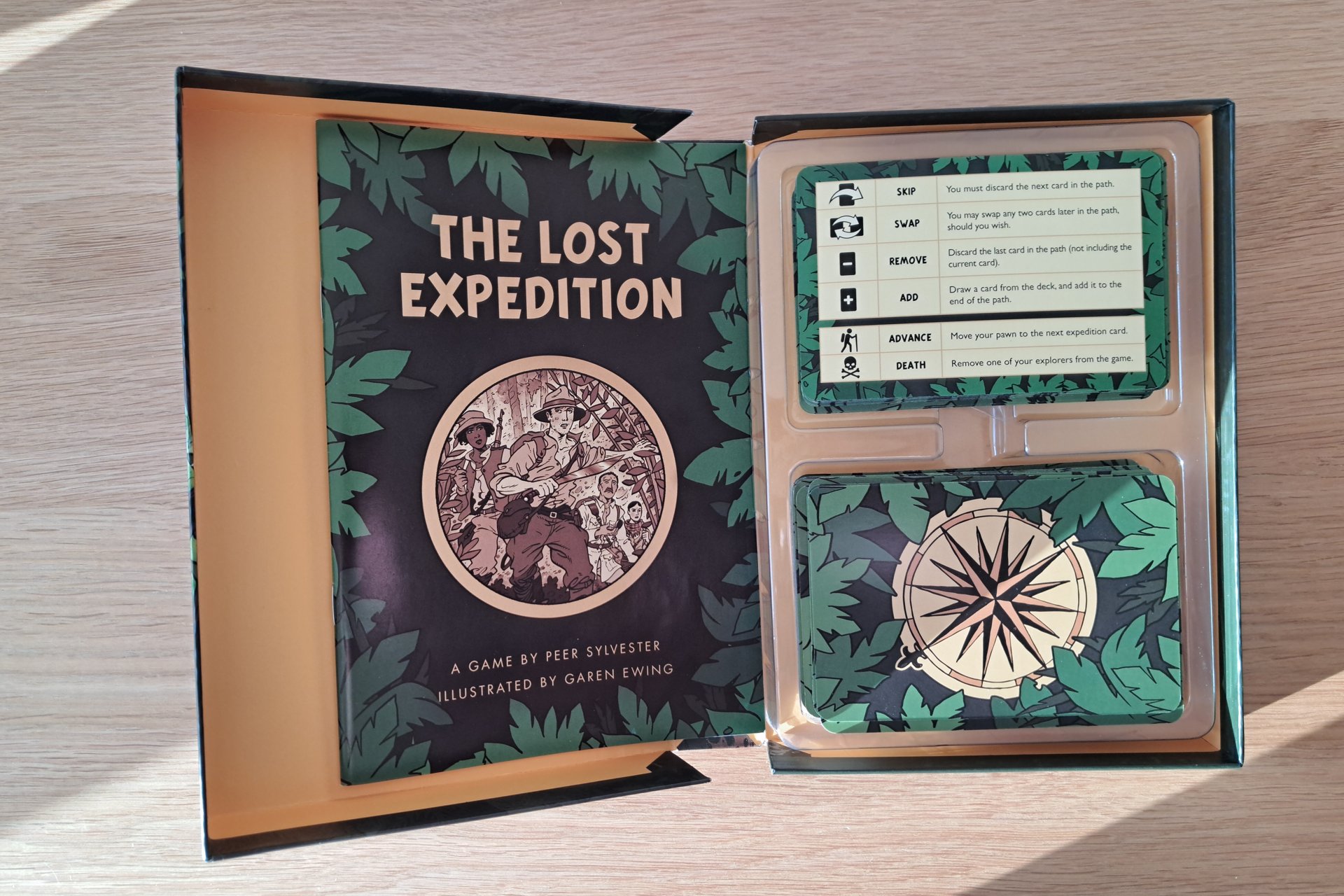 Inside view of The Lost Expedition card game with all the cards.