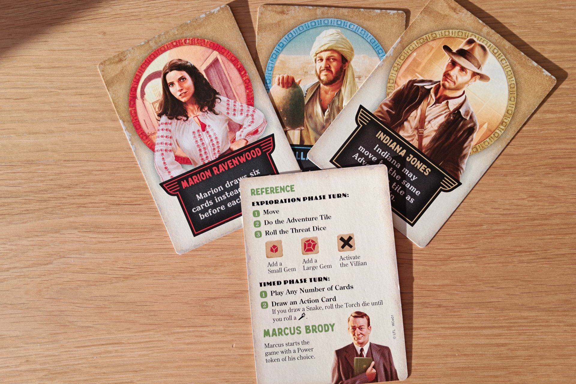 Four character cards from the Indiana Jones Sands of Adventure board game.