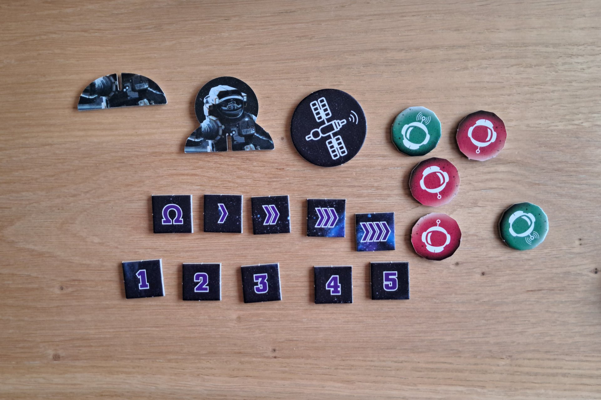 The Crew The Quest for Planet Nine game tokens including the commander token, task cards, and radio communication tokens.